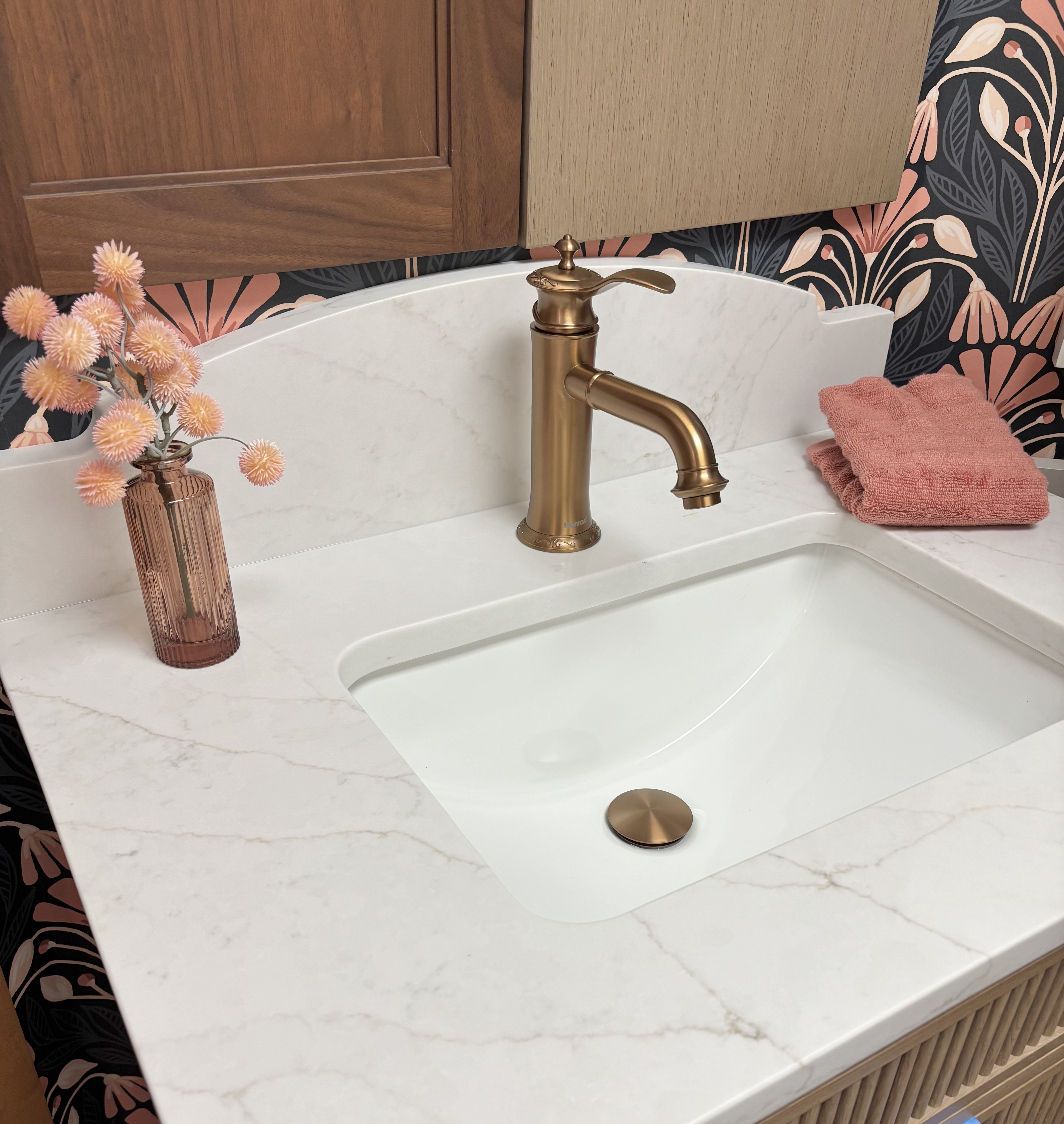 light quartz vanity top with soft gold marble veining